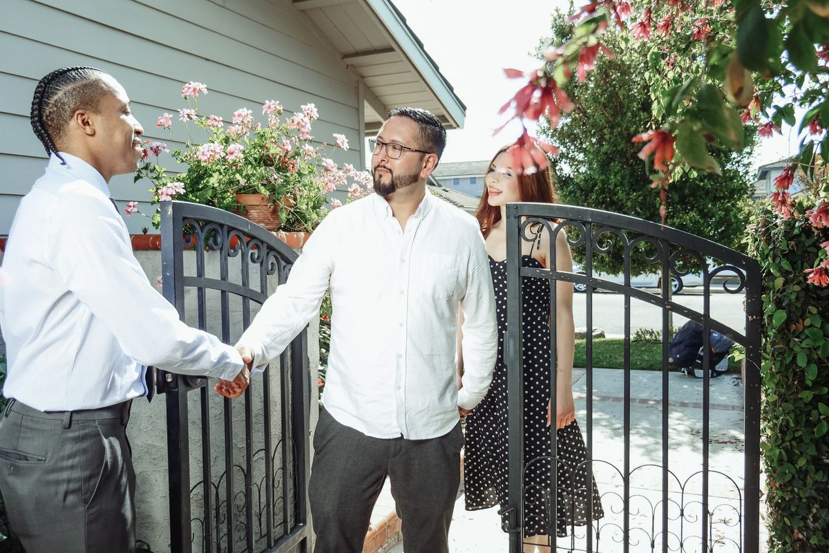 Landlord shaking hands with a trusted local contractor
