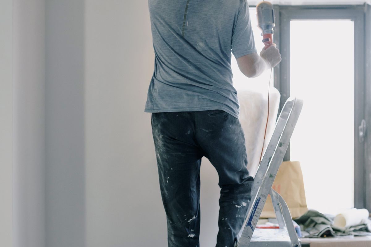 A repair pro at work fixing a job dispatched through NiceList