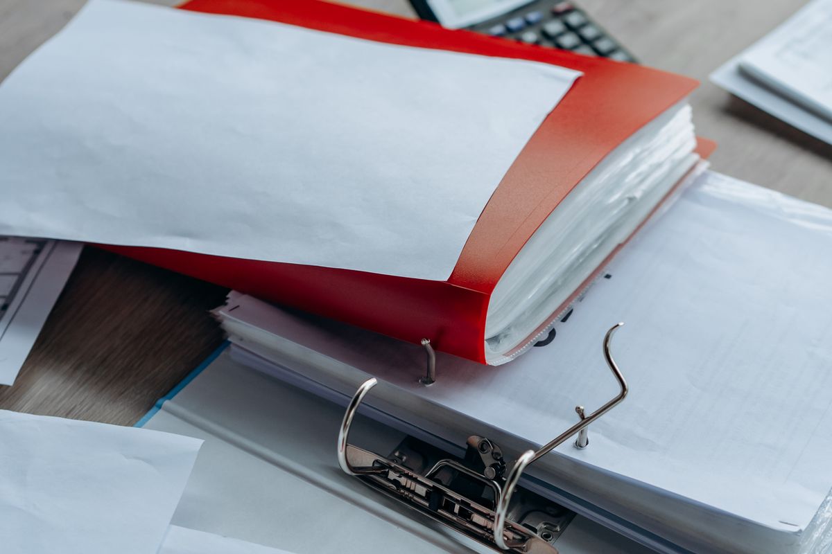 Organized property documents on a desk