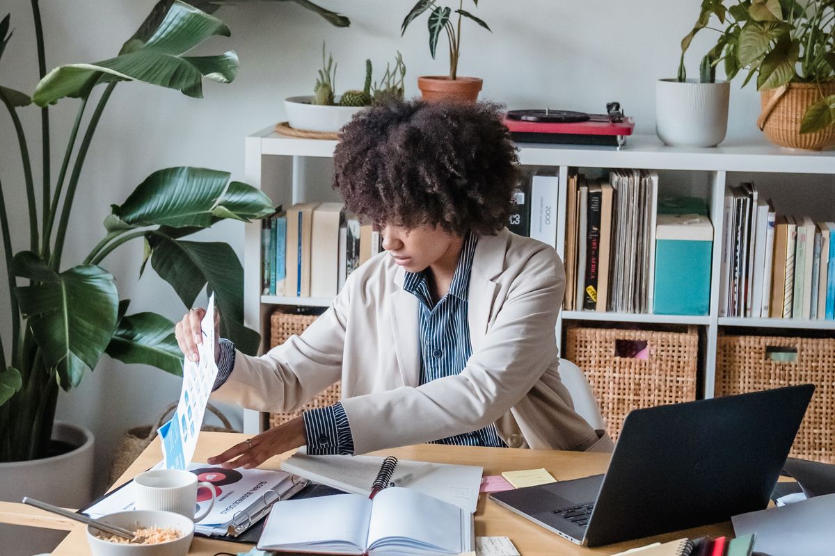 Tidy home workspace with a laptop and documents